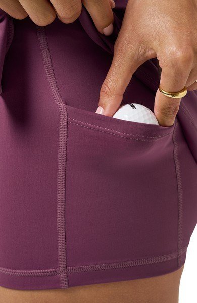 Travis Mathew Game Set Match Moveknit women's skort, damson