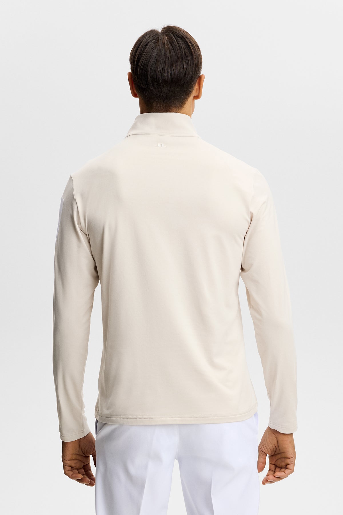 J.Lindeberg Keaton Quarter Zip Mid Layer Moonbeam – detail of rubber sleeve print and quarter zip