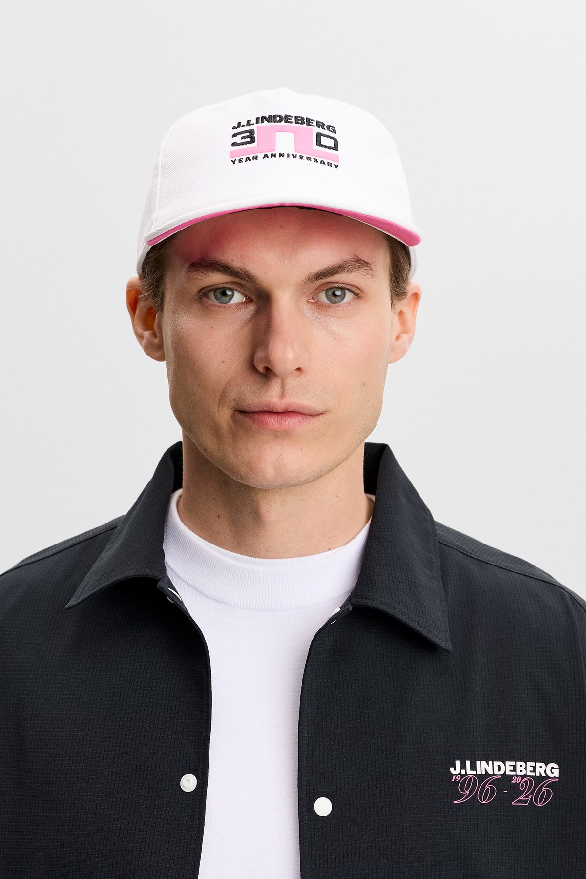 J.Lindeberg 30Y Anniversary Cap White – front and back anniversary branding detail