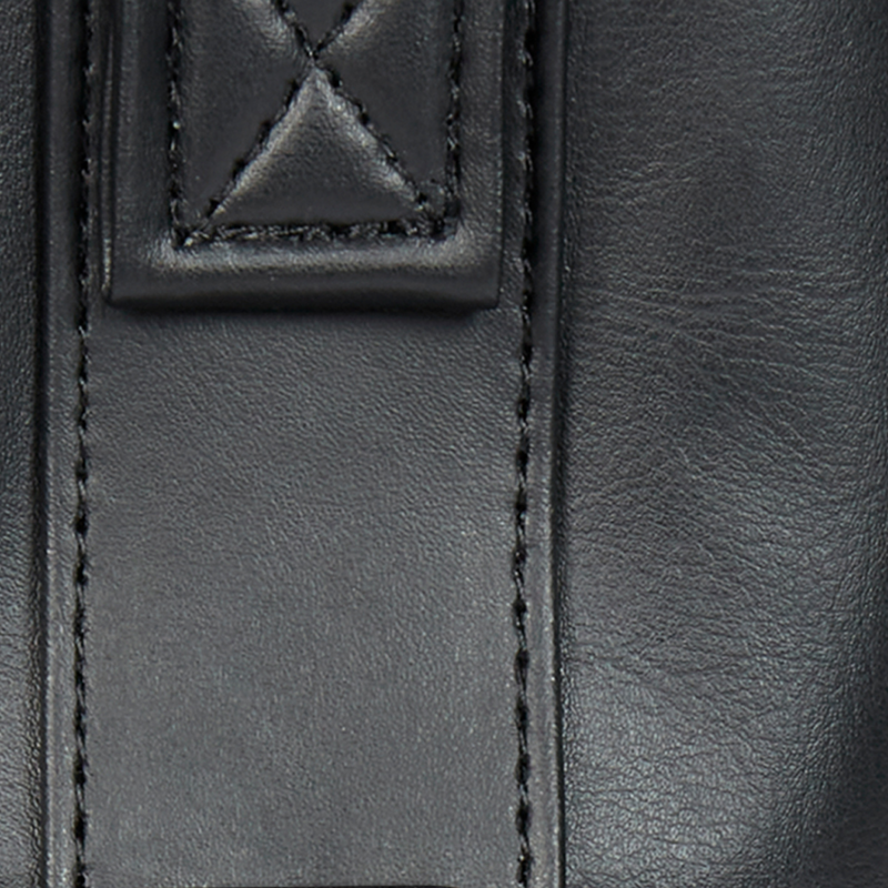 Premium Synthetic Water-Resistant Material with quilted detailing