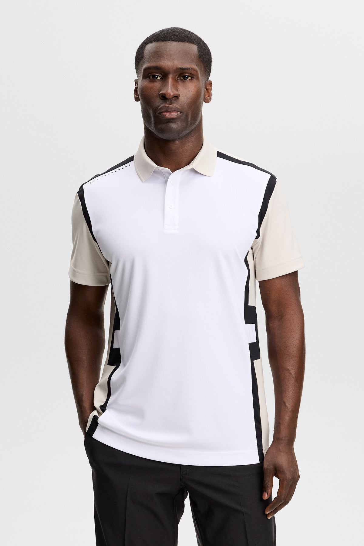 J.Lindeberg Finn Polo Moonbeam side view highlighting moisture-wicking performance panels