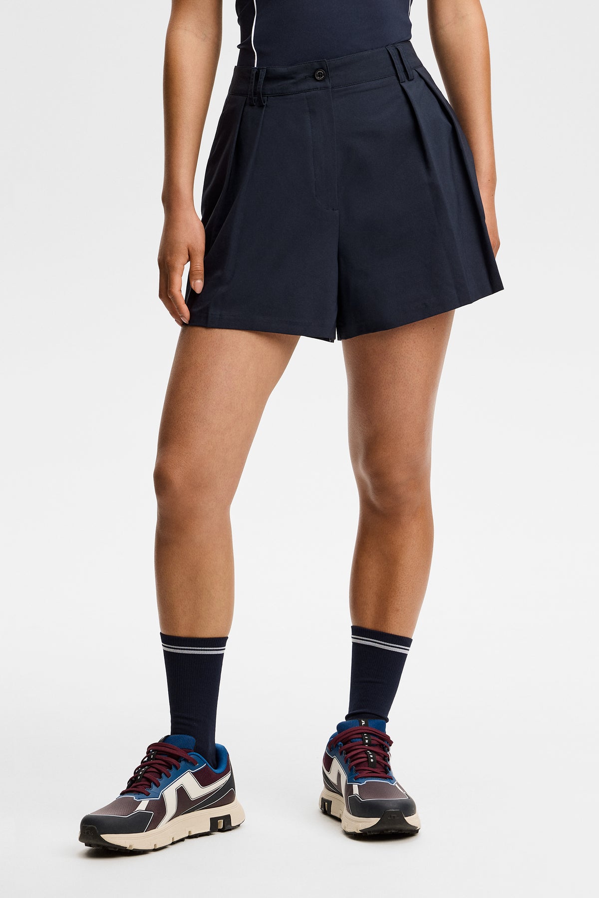 J.Lindeberg Carmen Shorts JL Navy – front view showing high-rise waist and front pleats