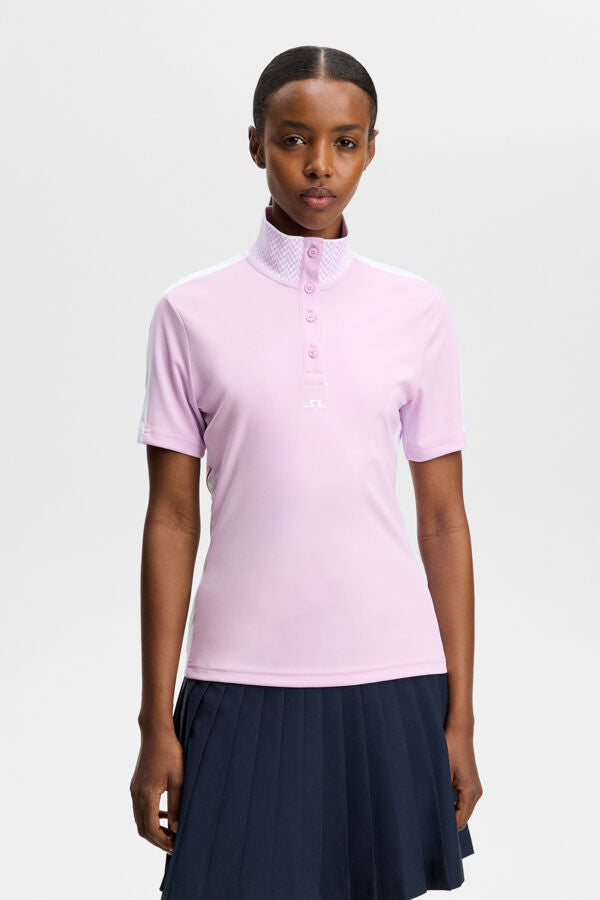J.Lindeberg Pip Polo Orchid Bouquet – front view showing jacquard fabric and contrast panels