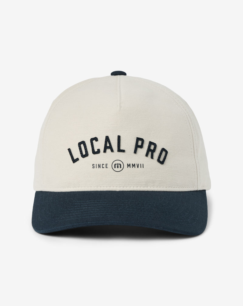 Travis Mathew Local Pro Snapback Hat – front view, white