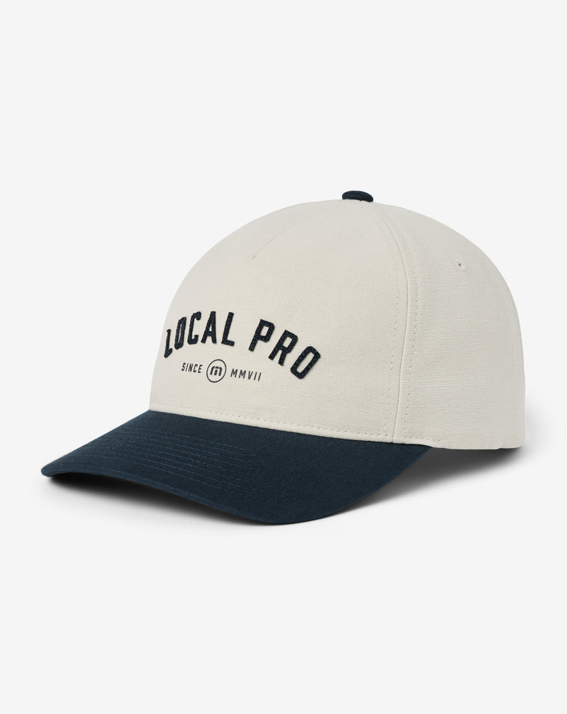 Travis Mathew Local Pro Snapback Hat – side profile, white