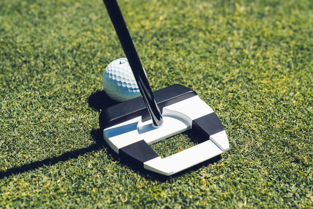 Odyssey Ai-DUAL Square 2 Square Jailbird putter on a green
